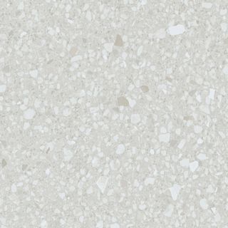 Film adhésif décoratif Cover Styl NL16 Mixed white, décor terrazzo blanc à petits fragments clairs sur fond légèrement grisé et finition Standard mate pour meubles, murs et escaliers.